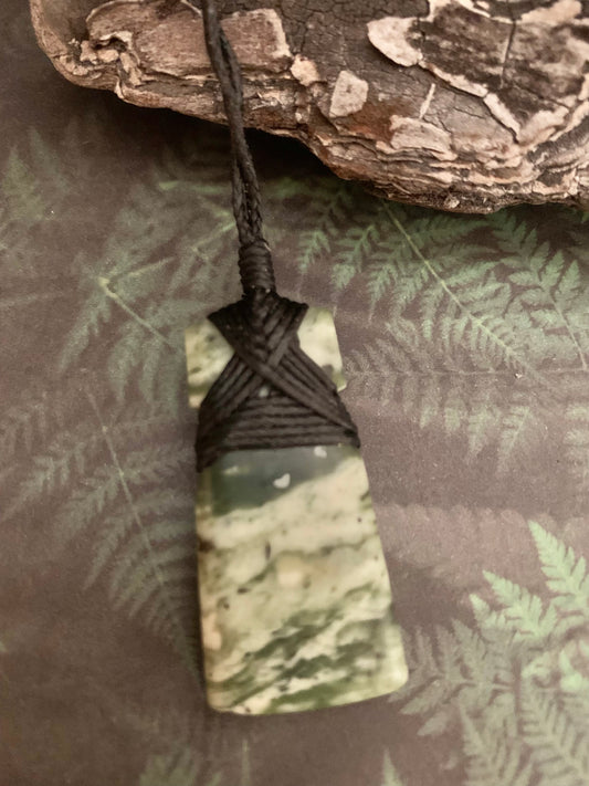 Maori Pounamu hei toki pendant from New Zealand available at Silver Fern Gallery