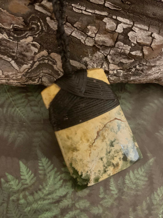 Maori Flower Jade Pounamu hei toki pendant from New Zealand available to purchase