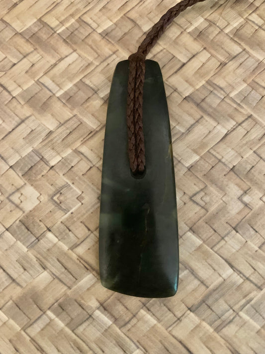 Contemporary Maori Pounamu hei toki pendant from New Zealand by Alex Sands available to purchase