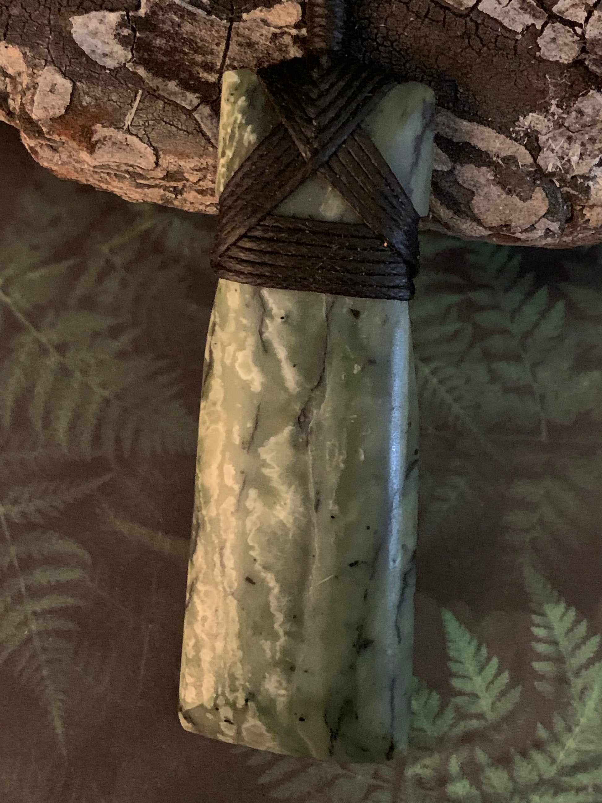 Maori Pounamu hei toki pendant from New Zealand available to purchase at Silver Fern Gallery