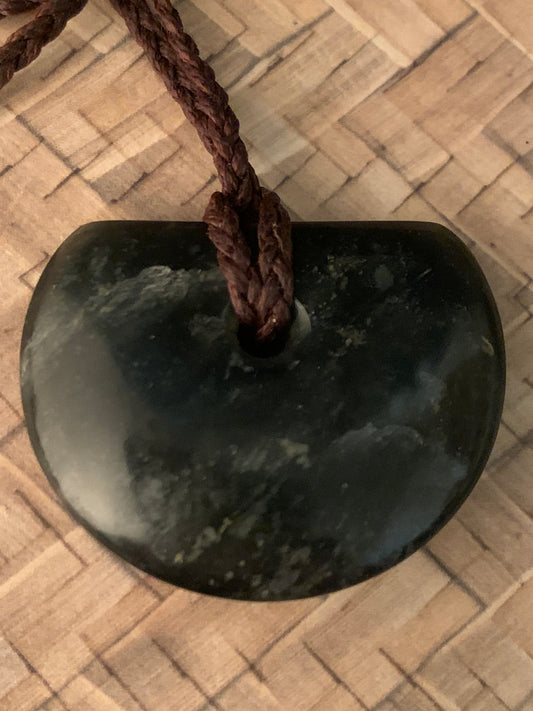 reverse side of New Zealand Maori freeform pounamu adornment available from Silver Fern gallery