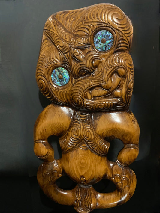 large Maori tiki carved in New Zealand and available from Silver Fern Gallery