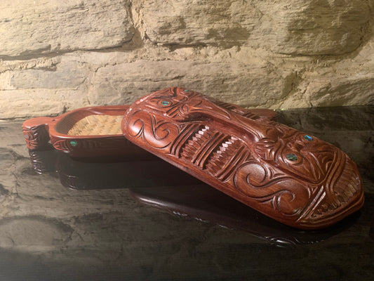 showing removable lid of Maori wakahuia jewellery treasure box carved in New Zealand and available from Silver Fern Gallery