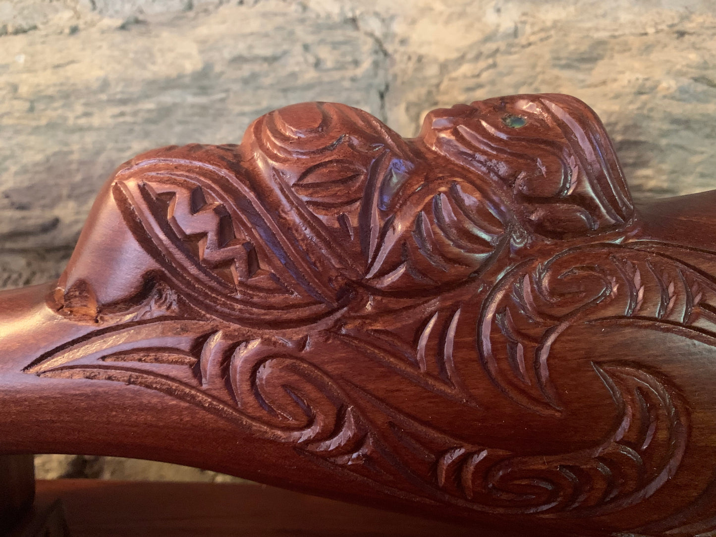 Maori War God "Tu" carved on a wahaika weapon 
