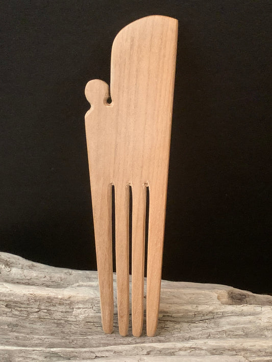 reverse side of heru - Maori hair comb
