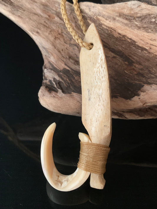 whalebone hei matau pendant a New Zealand Maori traditional adornment