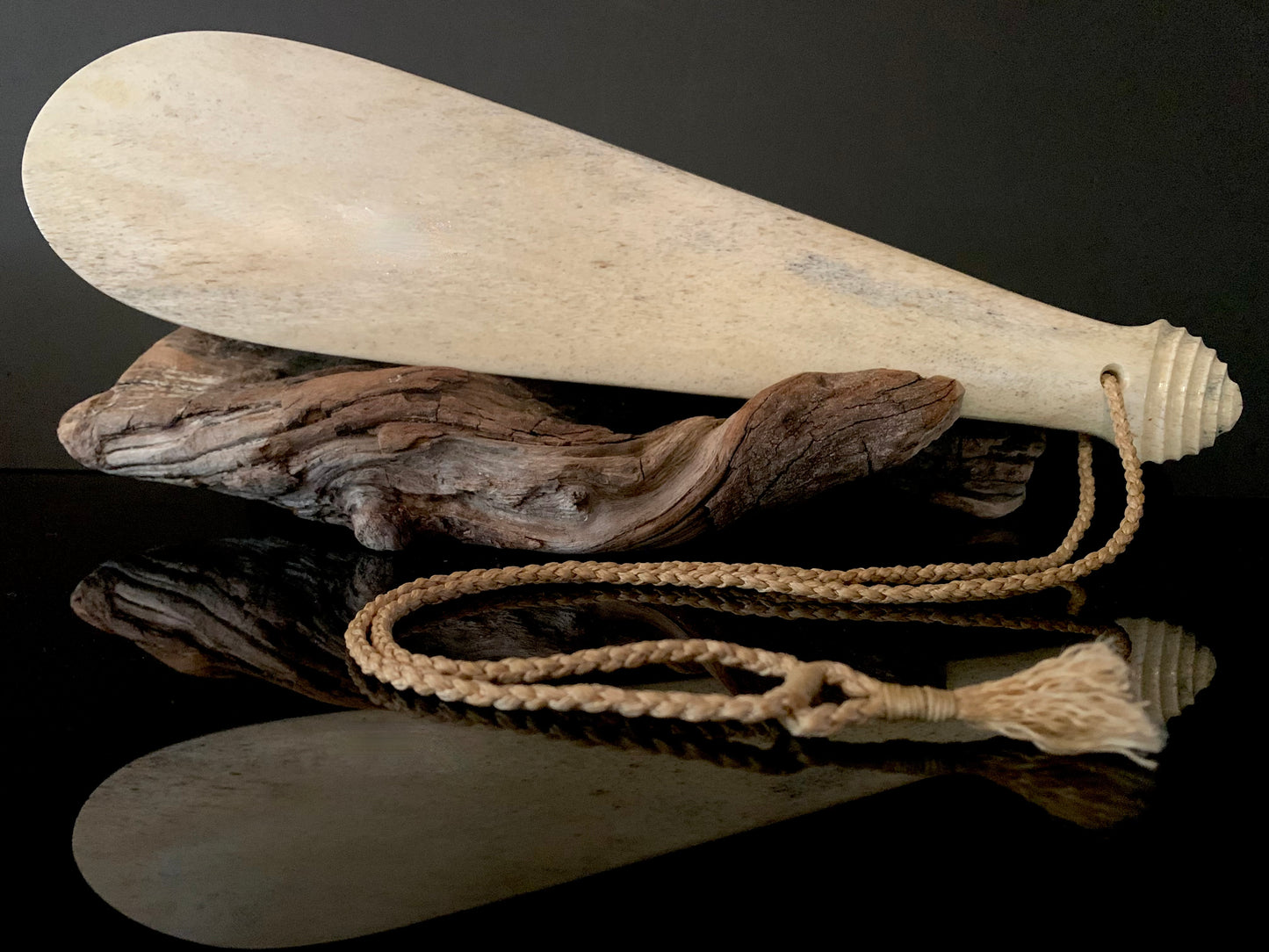 weapon made from whale bone carved in New Zealand by Maori 