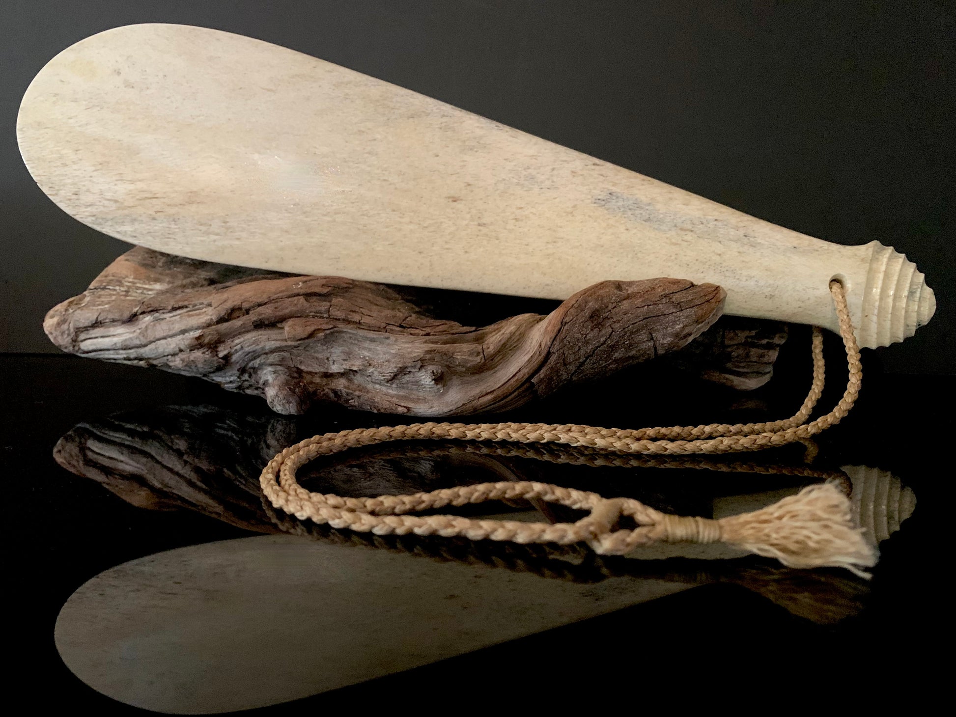 weapon made from whale bone carved in New Zealand by Maori 