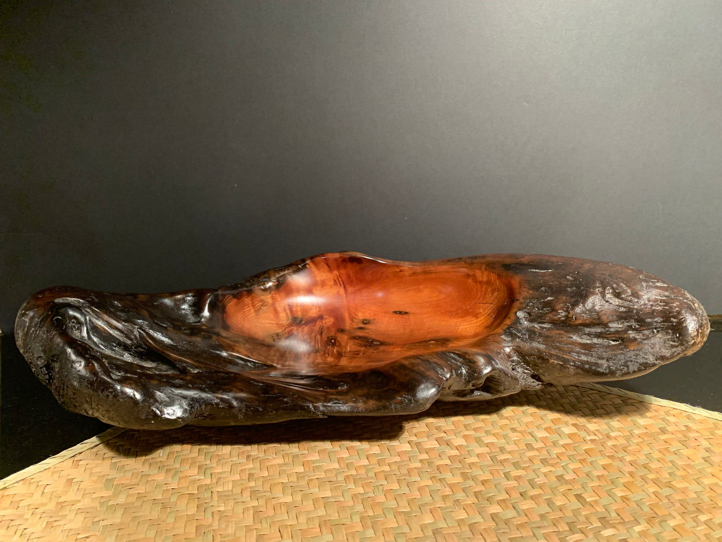 Large feature bowl with a handworked interior and dark natural exterior.