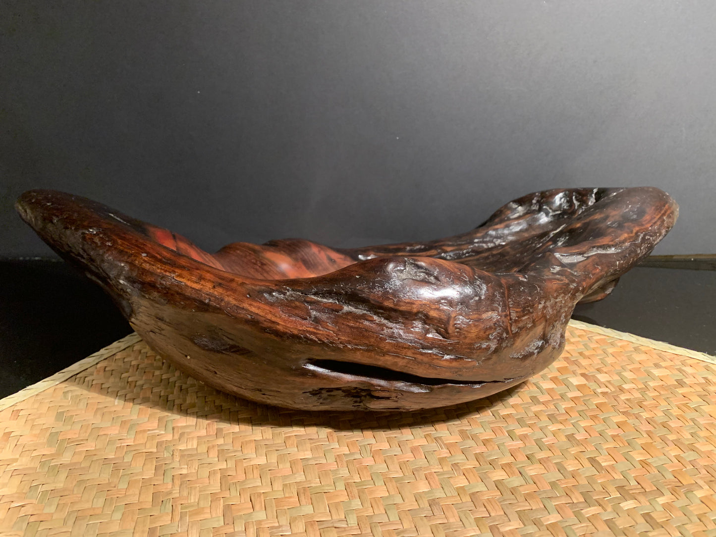 Feature wooden bowl with a natural, rustic finish.