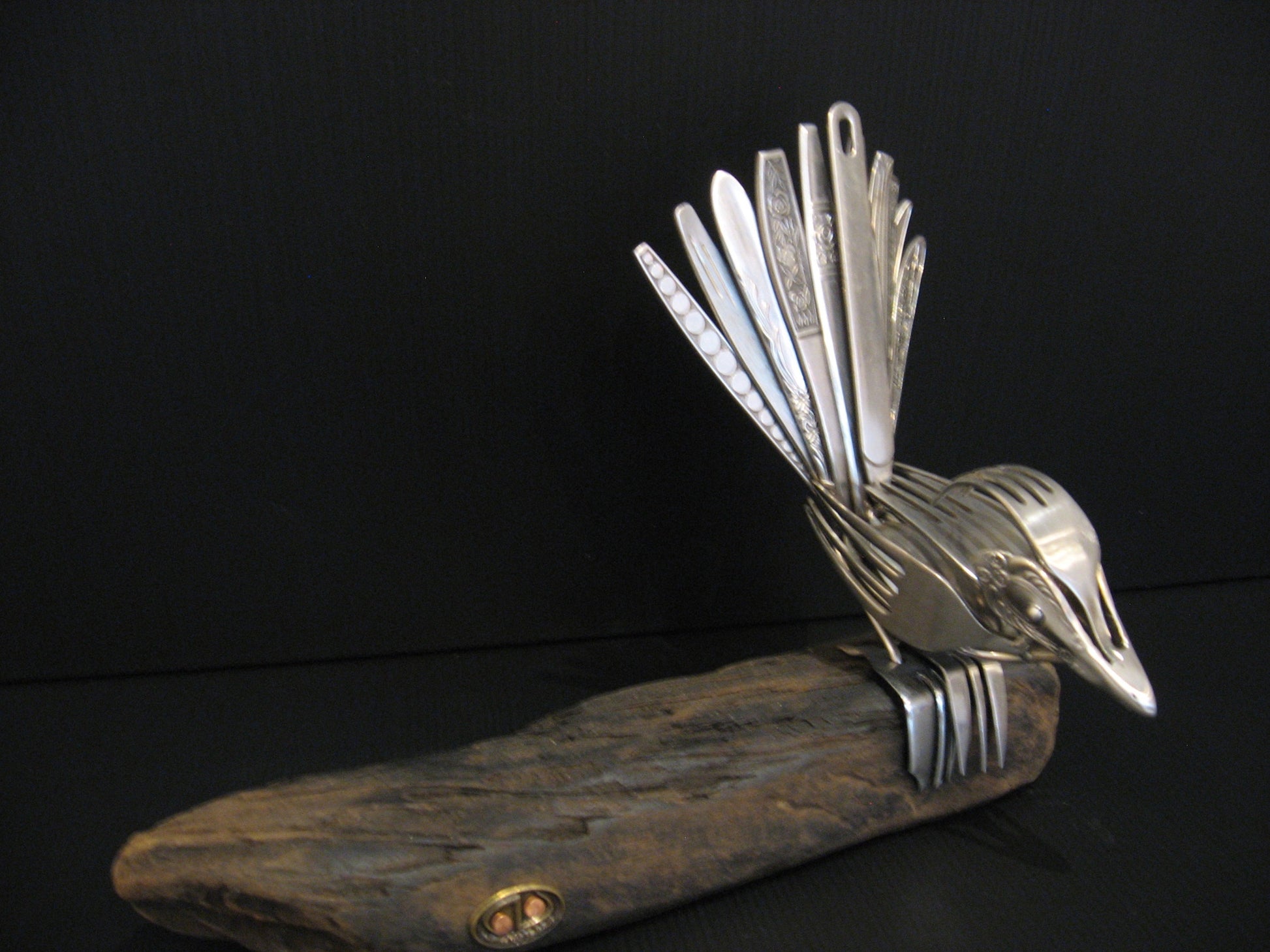 Sculpture from Cutlery Piwakawaka (Fantail) by Nathan Hull Silver Fern Gallery