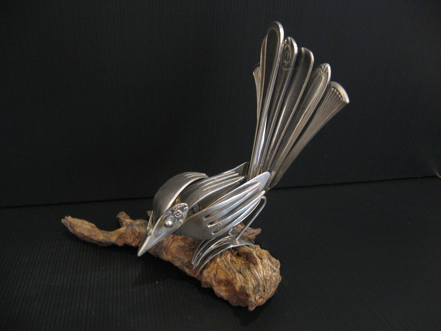 Sculpture from Cutlery Piwakawaka (Fantail) by Nathan Hull Silver Fern Gallery