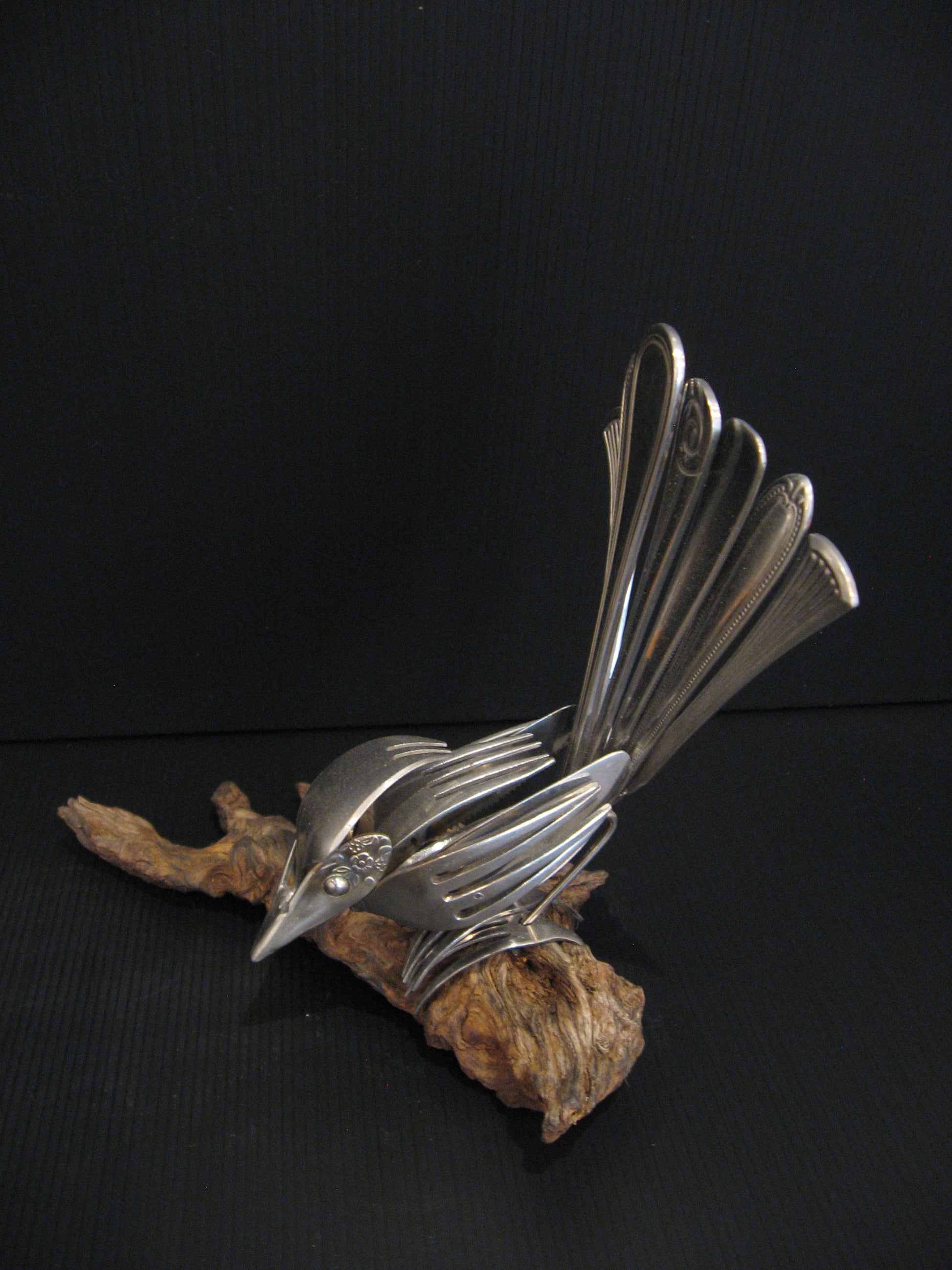 Sculpture from Cutlery Piwakawaka (Fantail) by Nathan Hull Silver Fern Gallery