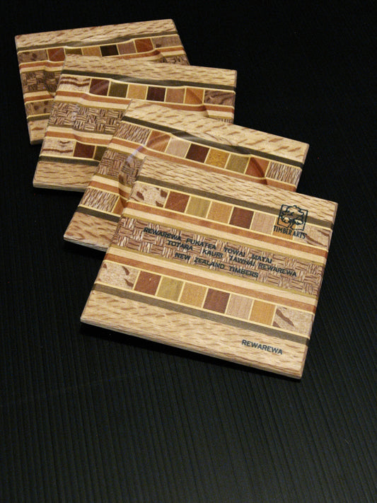 back of Set of Four Coasters showing many NZ Native Timbers with rewarewa wood border by Timber Arts Silver Fern Gallery