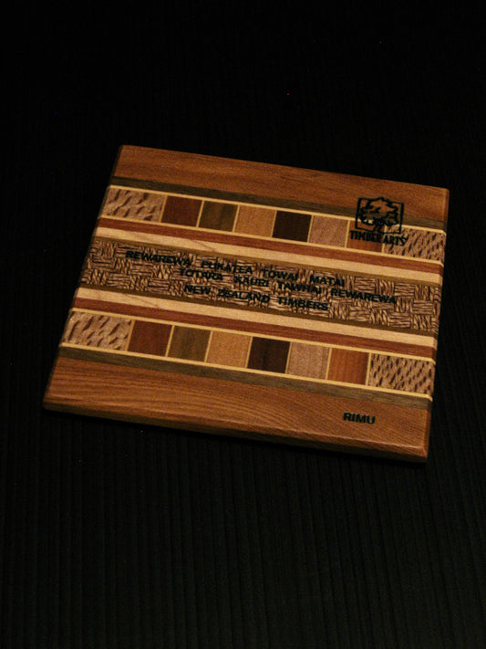back of Coaster showing many NZ Native Timbers with rimu border by Timber Arts Silver Fern Gallery