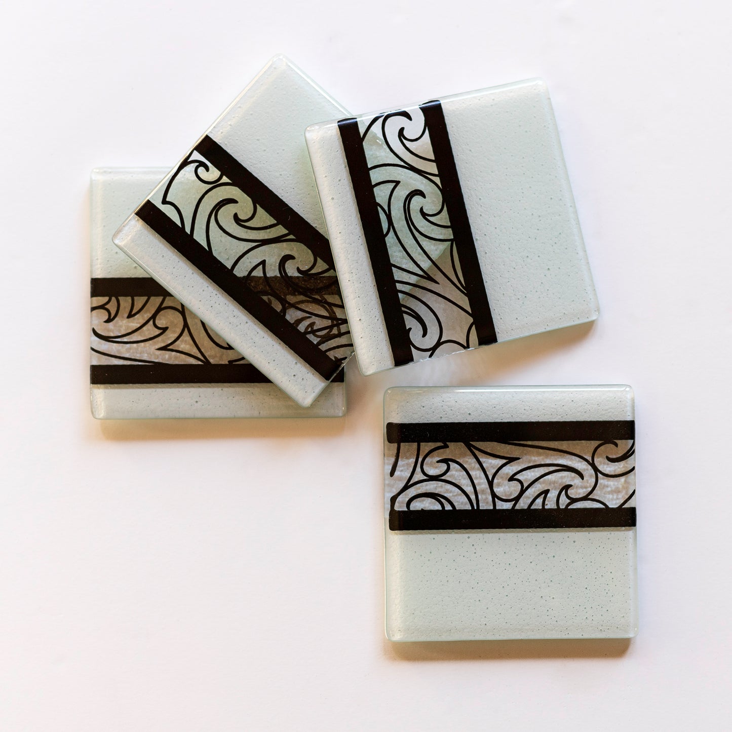 Fused Glass Coaster Set by Maori Boy Rongo Design White and Black Silver Fern Gallery 