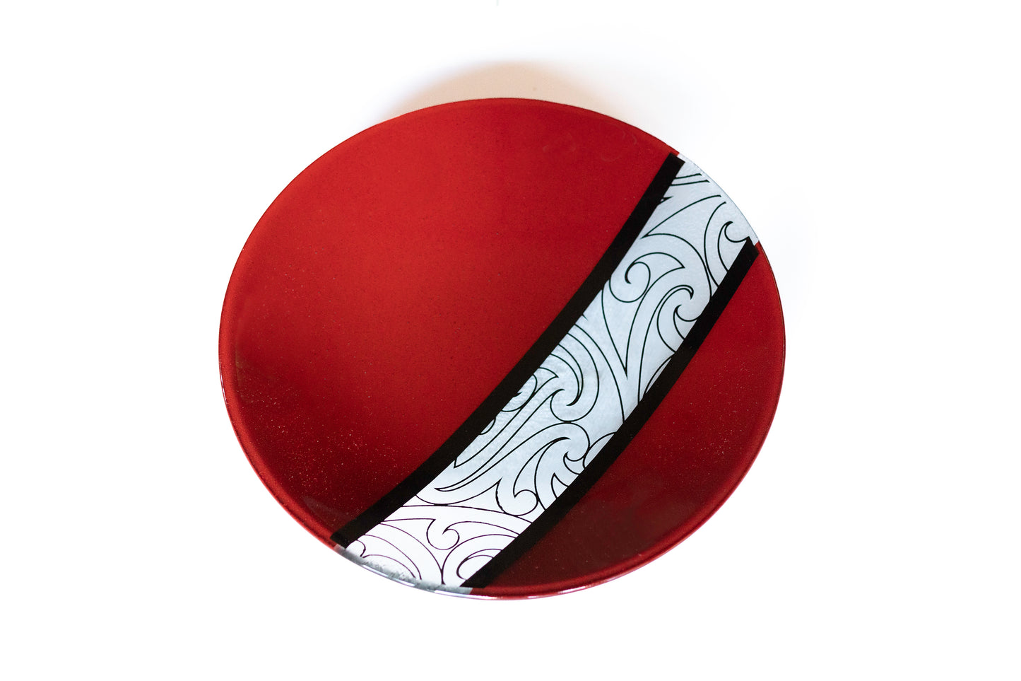 Above view of Fused Glass Bowl by Maori Boy - Rongo Design (red and black) Silver Fern Gallery