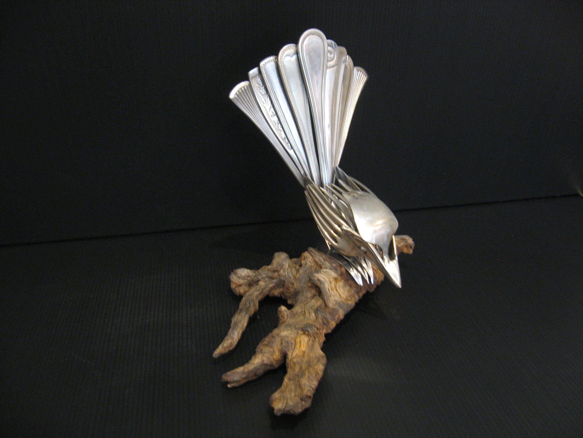 Sculpture from Cutlery Piwakawaka (Fantail) by Nathan Hull Silver Fern Gallery