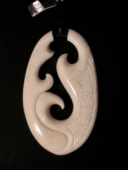 Fish hook necklace carved from bovine bone : r/crafts